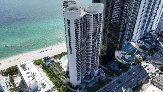 aerial view with a view of the beach and a water view