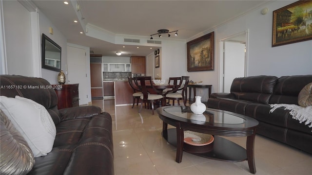 tiled living room with ornamental molding