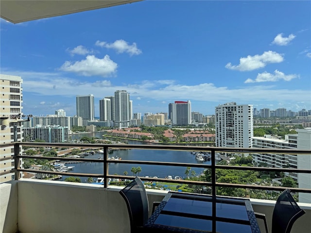 balcony featuring a water view