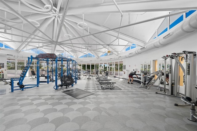 gym with high vaulted ceiling