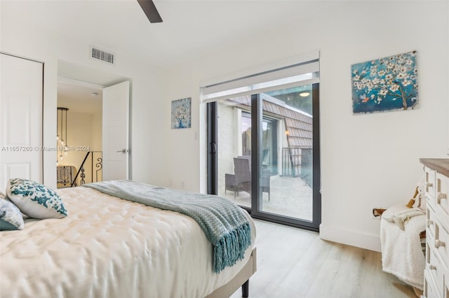 bedroom with ceiling fan, light wood-type flooring, and access to exterior