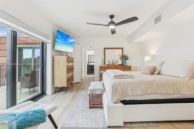 bedroom featuring light hardwood / wood-style floors, access to exterior, and ceiling fan