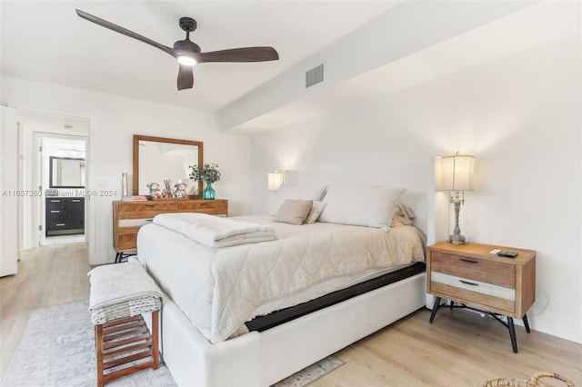 bedroom with light hardwood / wood-style flooring and ceiling fan