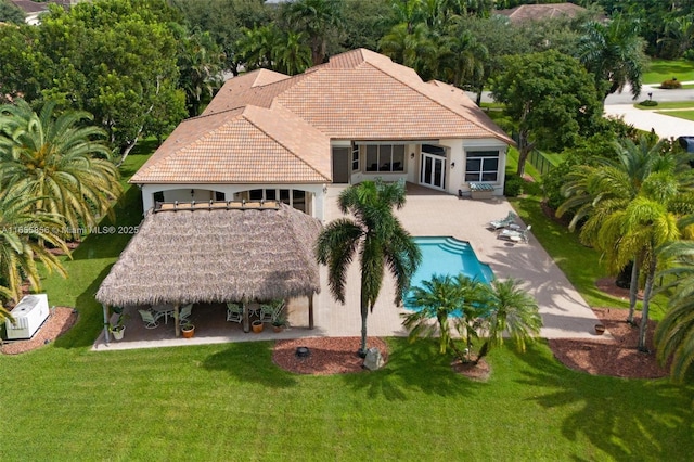 view of swimming pool with a gazebo and a patio area