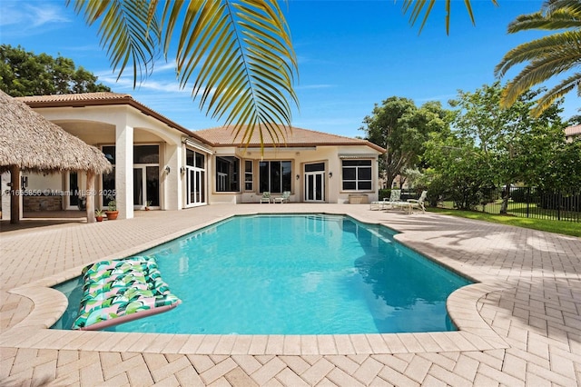 view of swimming pool featuring a patio