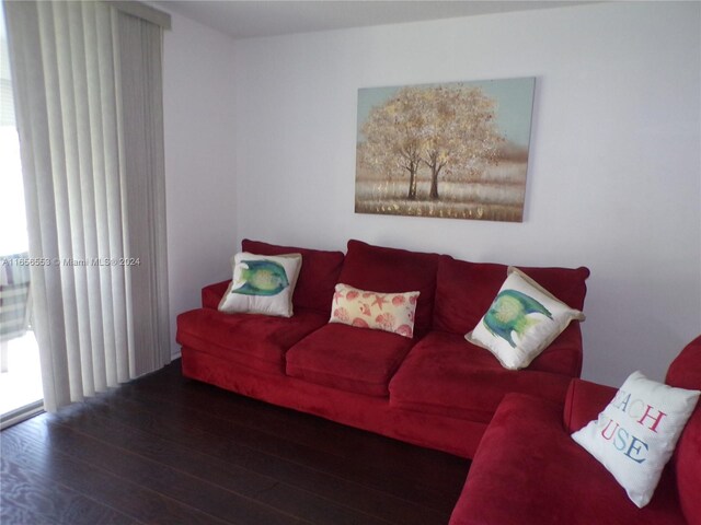 living room featuring dark hardwood / wood-style floors