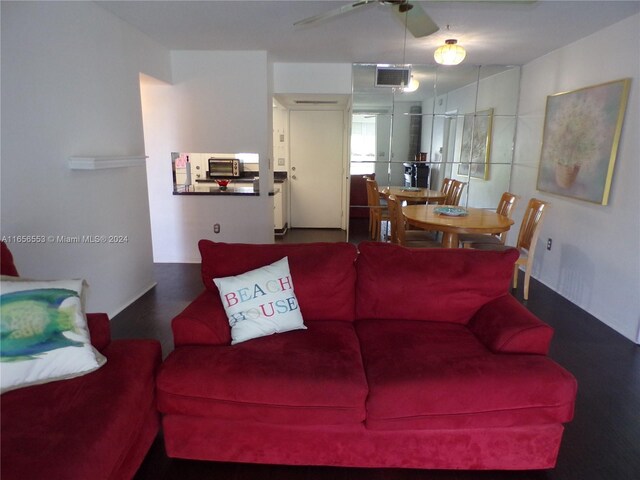 living room featuring ceiling fan