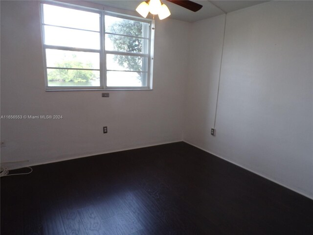 unfurnished room featuring ceiling fan and hardwood / wood-style flooring