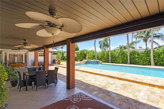 view of pool featuring ceiling fan and a patio