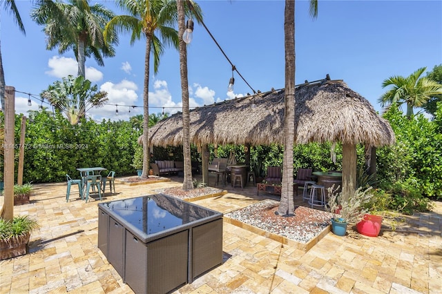 view of patio / terrace featuring a fire pit