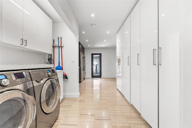 laundry room featuring washer and clothes dryer