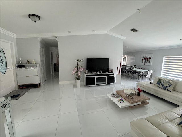 tiled living room featuring ornamental molding