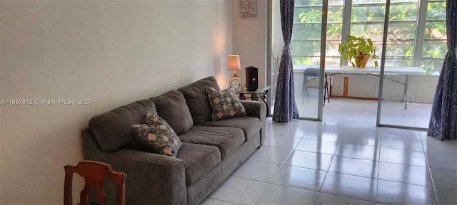 living room with light tile patterned flooring