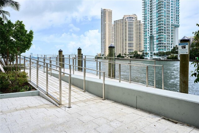 view of dock featuring sink and a water view