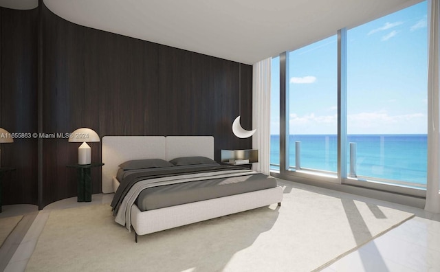 bedroom featuring a water view, expansive windows, and wooden walls