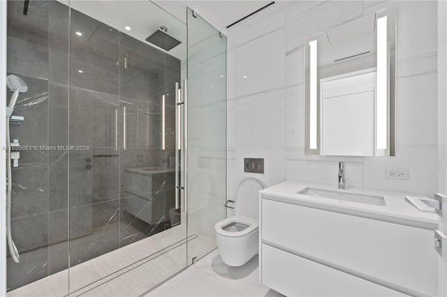 bathroom featuring a shower with shower door, toilet, tile walls, and vanity