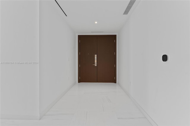 300 Biscayne Blvd Way Unit 2503, Miami, FL 33131 - hallway featuring light marble finish flooring and baseboards