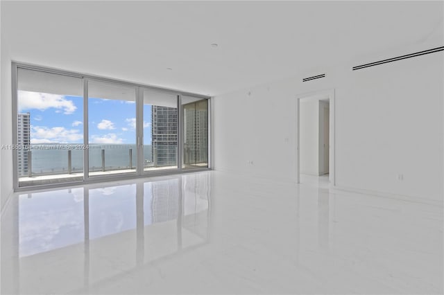 300 Biscayne Blvd Way Unit 2503, Miami, FL 33131 - empty room with expansive windows and a water view