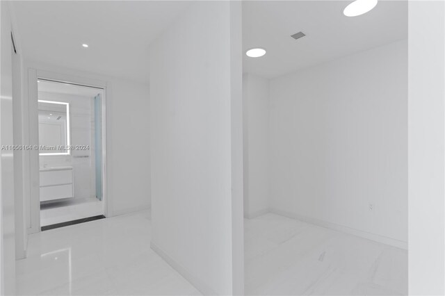 300 Biscayne Blvd Way Unit 2503, Miami, FL 33131 - bathroom featuring vanity, baseboards, and recessed lighting