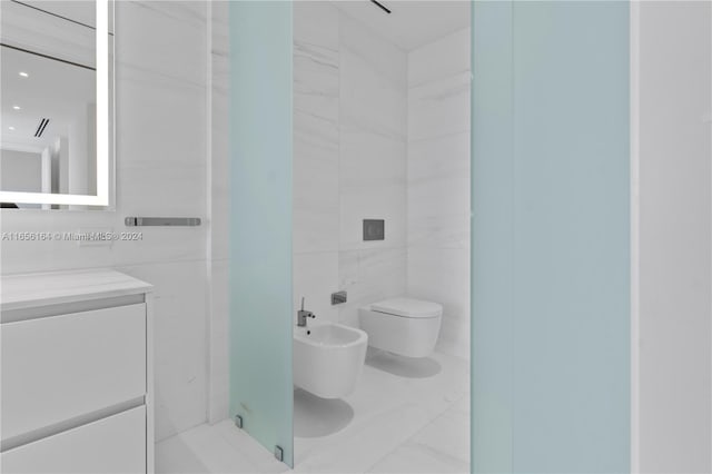 300 Biscayne Blvd Way Unit 2503, Miami, FL 33131 - bathroom featuring toilet, vanity, a bidet, a shower stall, and marble finish floors