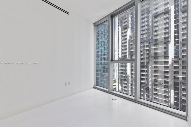300 Biscayne Blvd Way Unit 2503, Miami, FL 33131 - tiled empty room with expansive windows