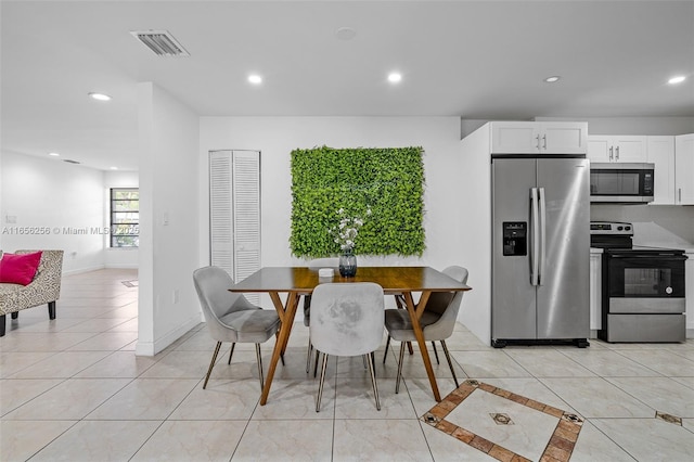 view of tiled dining room