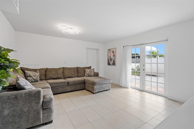 tiled living room with french doors