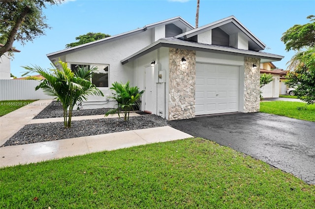 single story home with a front yard