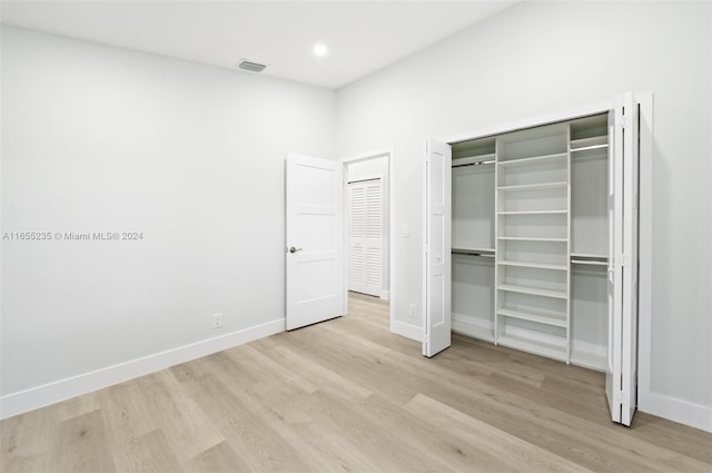 unfurnished bedroom featuring light hardwood / wood-style floors