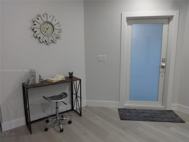 office area with light wood-type flooring