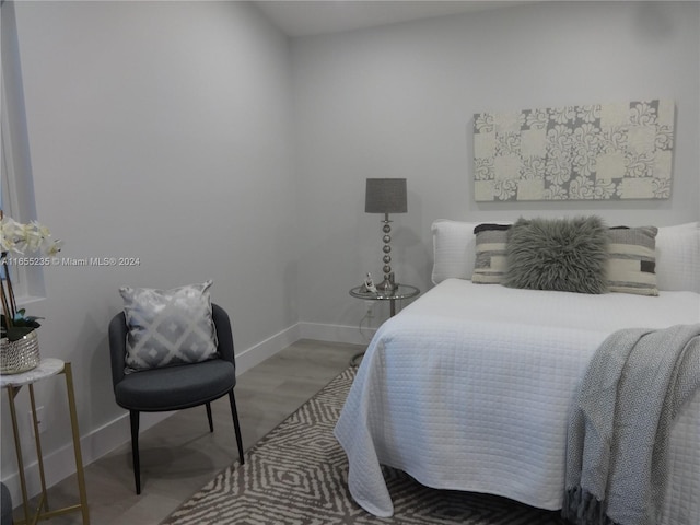 bedroom featuring light wood-type flooring