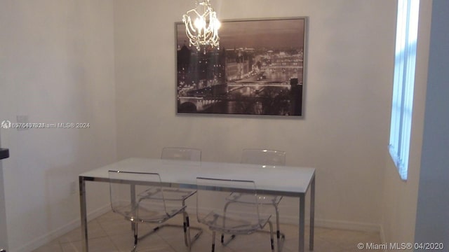 office area featuring light tile patterned floors and an inviting chandelier