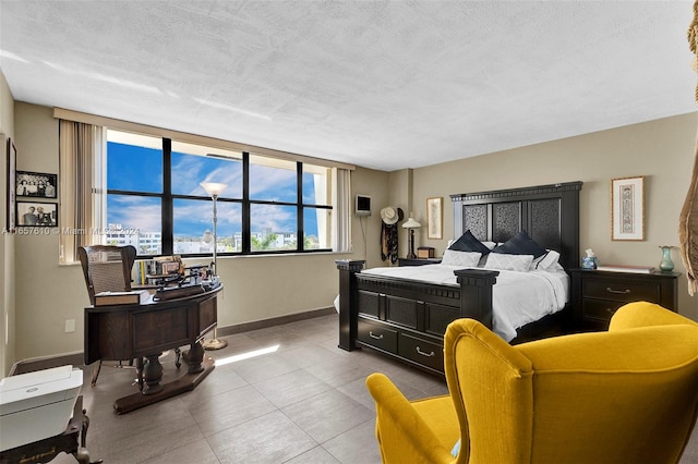 bedroom featuring a textured ceiling