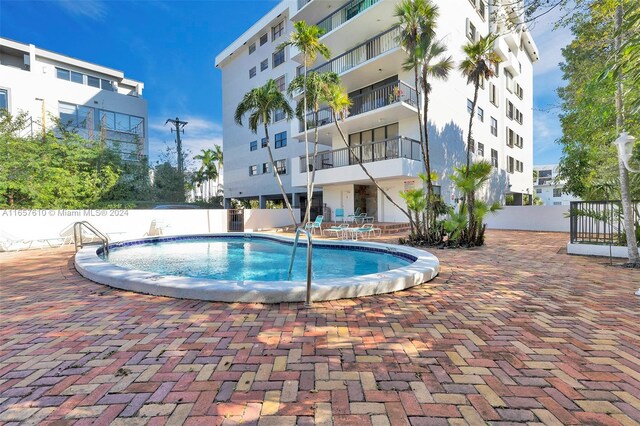 view of pool with a patio