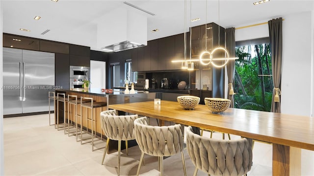 kitchen with appliances with stainless steel finishes and backsplash