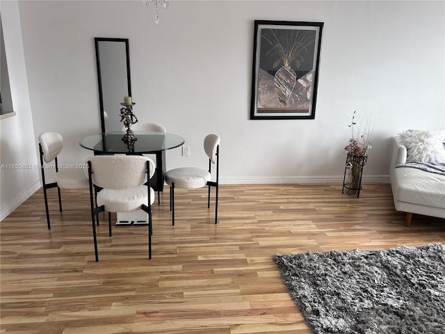 dining room with light hardwood / wood-style floors