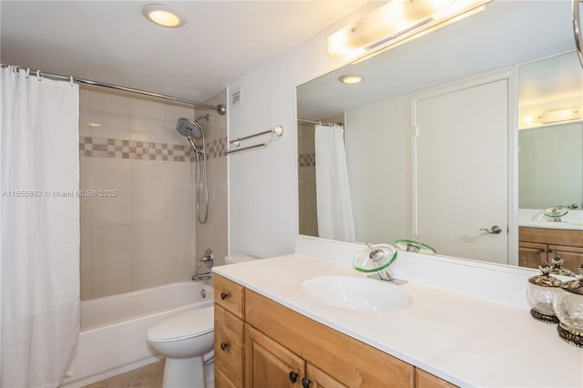 full bathroom with toilet, vanity, and shower / bath combo with shower curtain