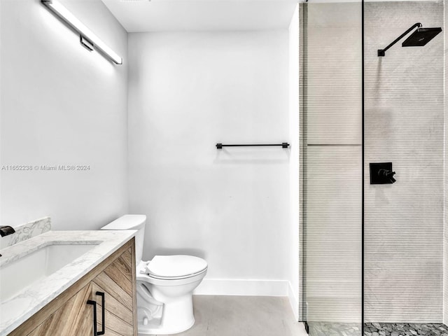 8109 Harding Ave, Miami Beach, FL 33141 - bathroom with vanity, baseboards, toilet, and tiled shower