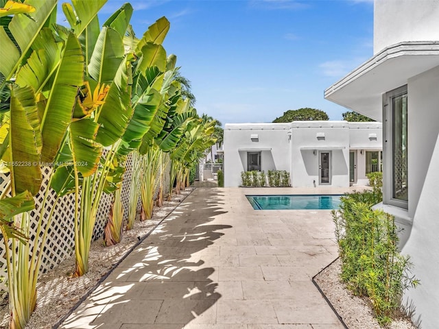 8109 Harding Ave, Miami Beach, FL 33141 - outdoor pool featuring fence and a patio area