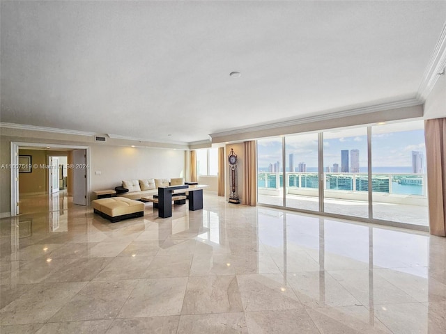 interior space with a water view, a healthy amount of sunlight, and crown molding