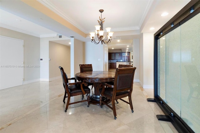 dining room with a notable chandelier and ornamental molding