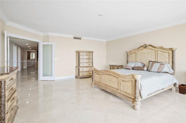 bedroom featuring crown molding