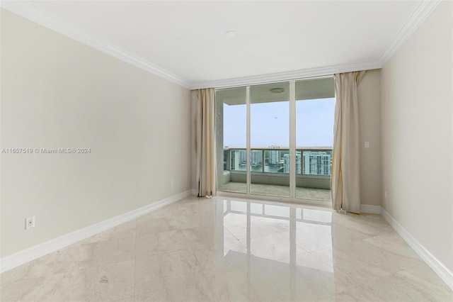 unfurnished room featuring floor to ceiling windows and ornamental molding