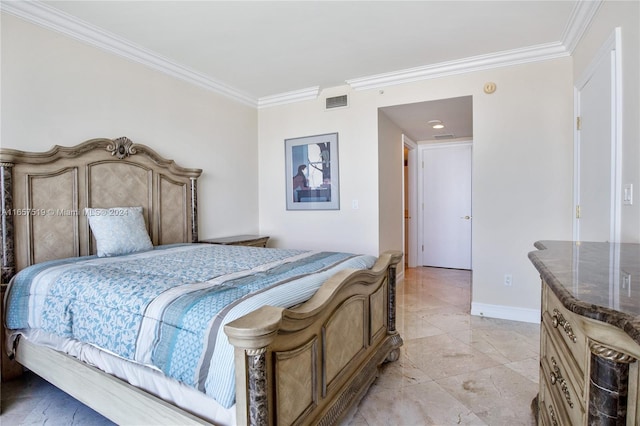 bedroom featuring crown molding