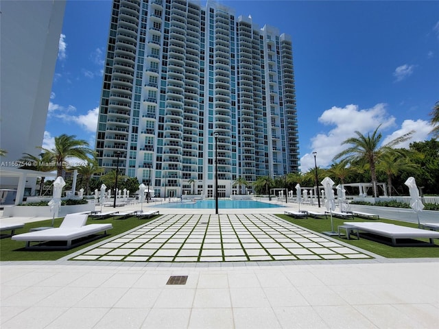 view of pool featuring a patio