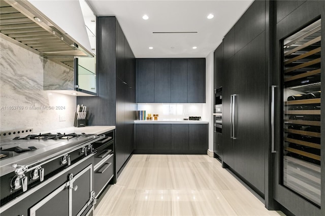 kitchen featuring wine cooler, stainless steel appliances, light tile patterned floors, and decorative backsplash