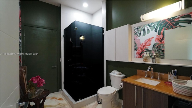 bathroom featuring walk in shower, vanity, and toilet