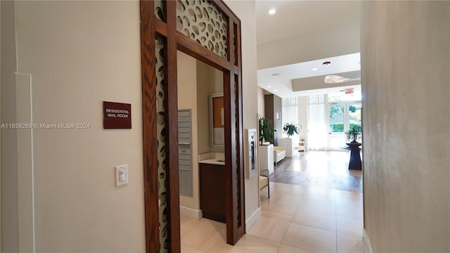 corridor with light hardwood / wood-style flooring