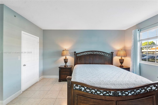 131 SW 117th Ave Unit 8103, Pembroke Pines, FL 33025 - bedroom with baseboards and light tile patterned flooring
