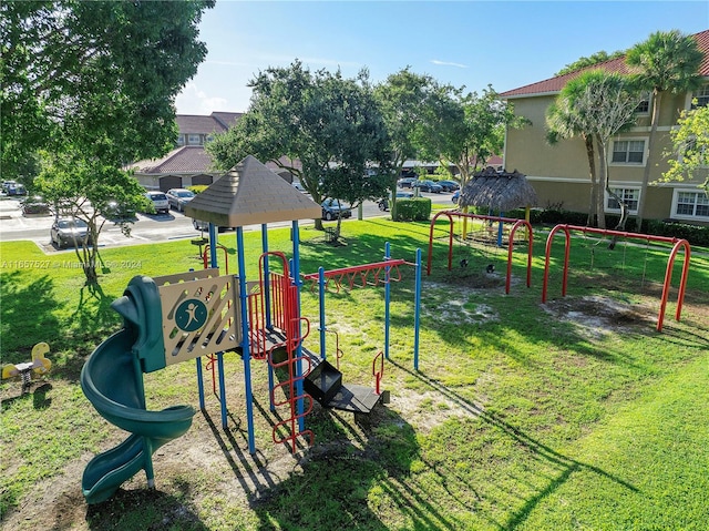 view of jungle gym featuring a yard